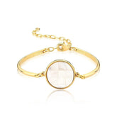 PULSEIRA PEDRA REDONDA EM MADREPÉROLA DOURADO